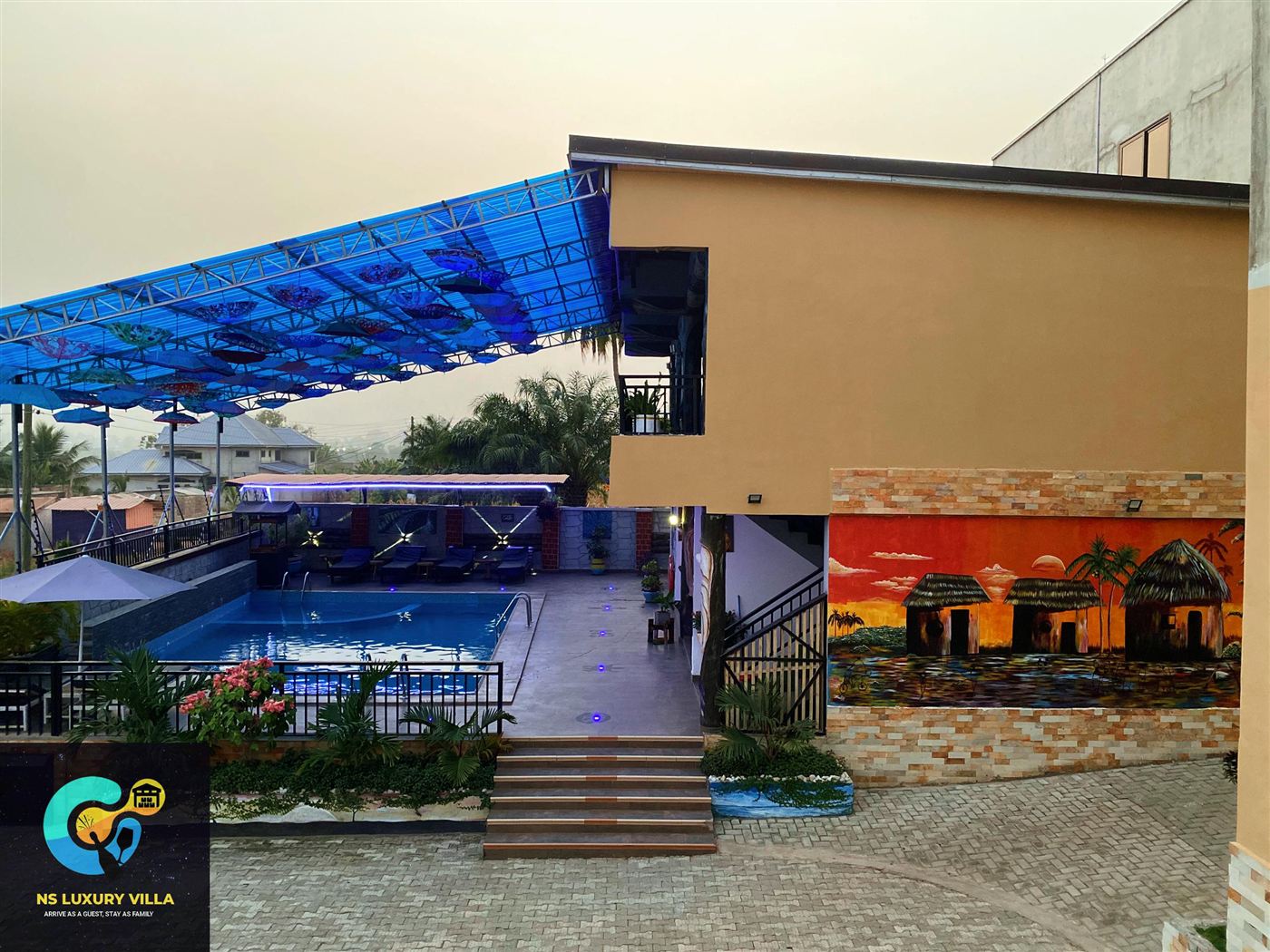 Pool and garden lounge at NS LUXURY VILLA