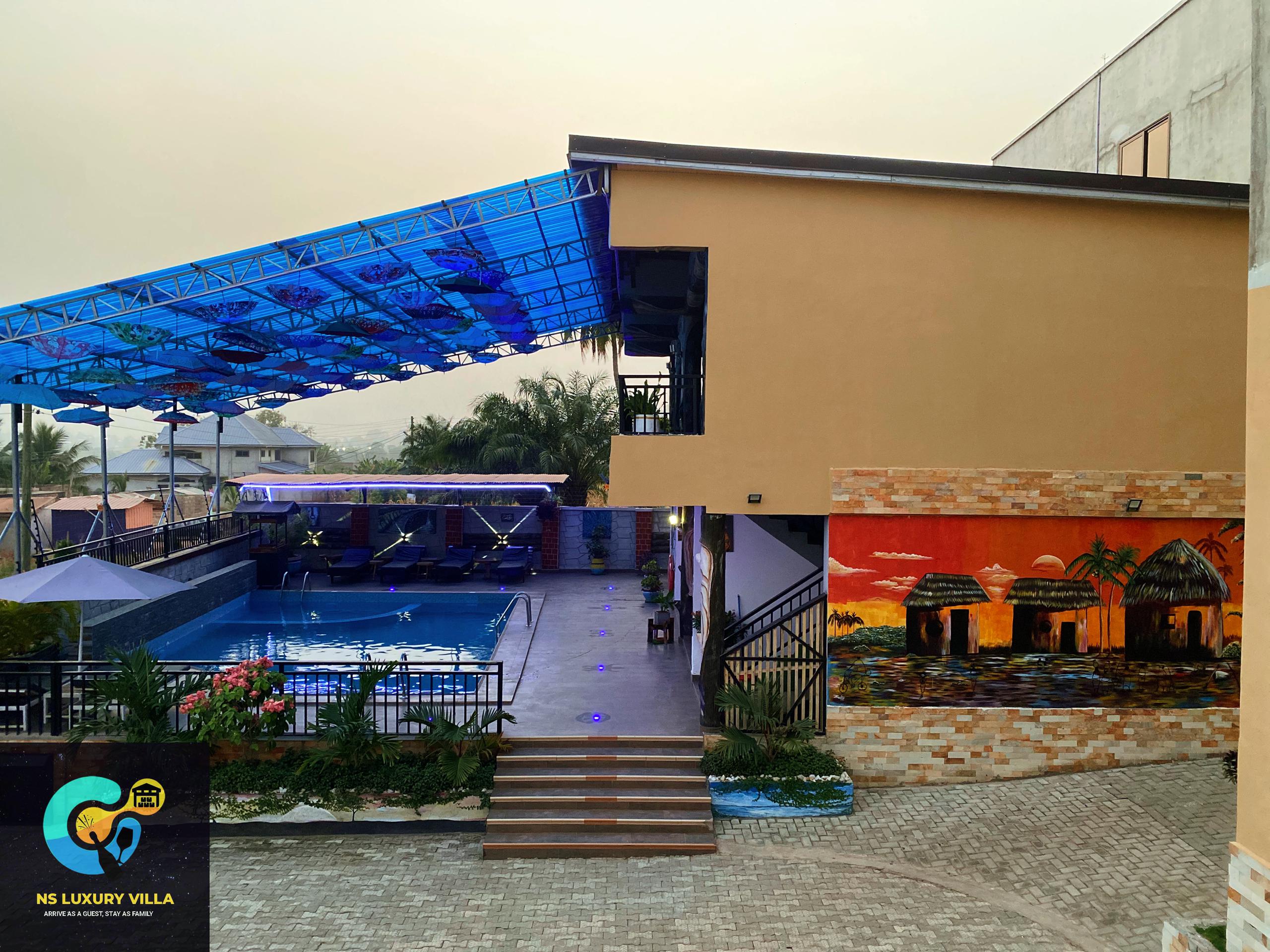 Pool, bar and outdoor spaces at NS LUXURY VILLA