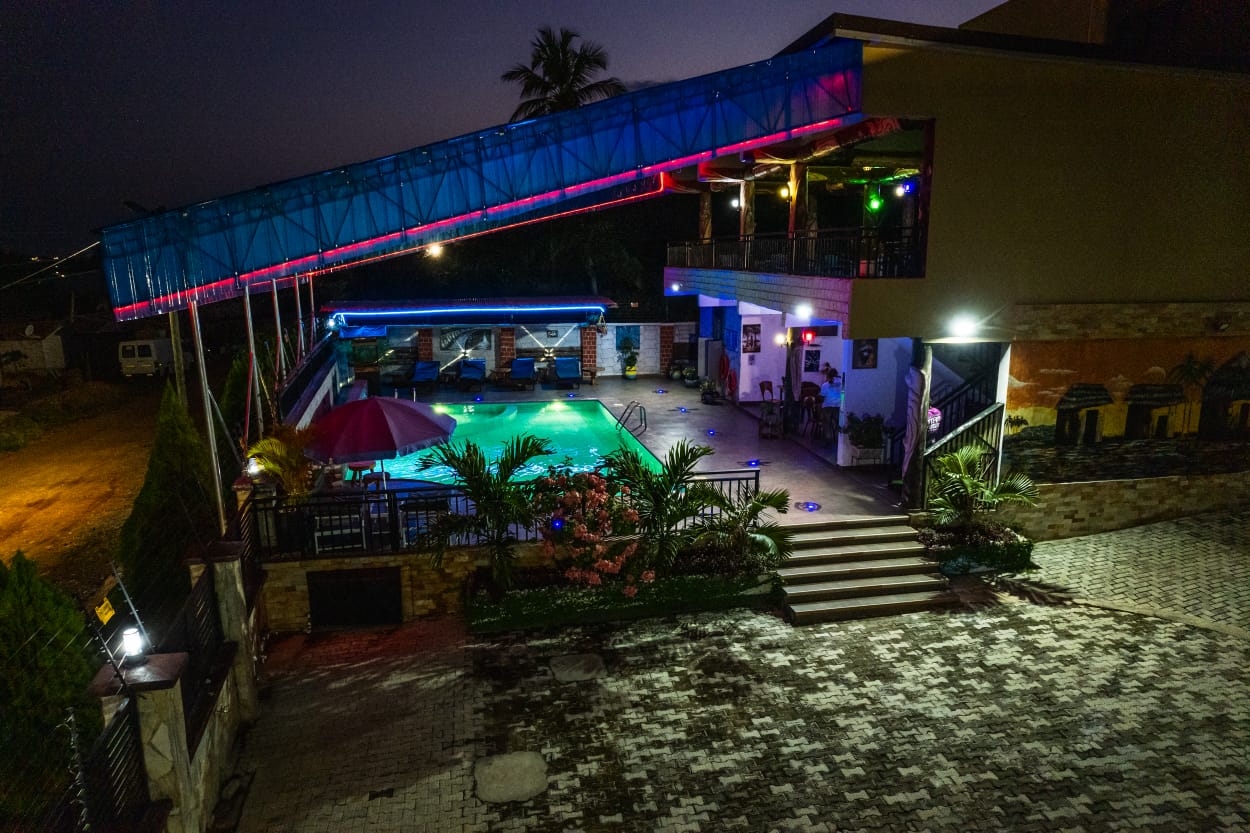 Pool entrance at night at NS LUXURY VILLA